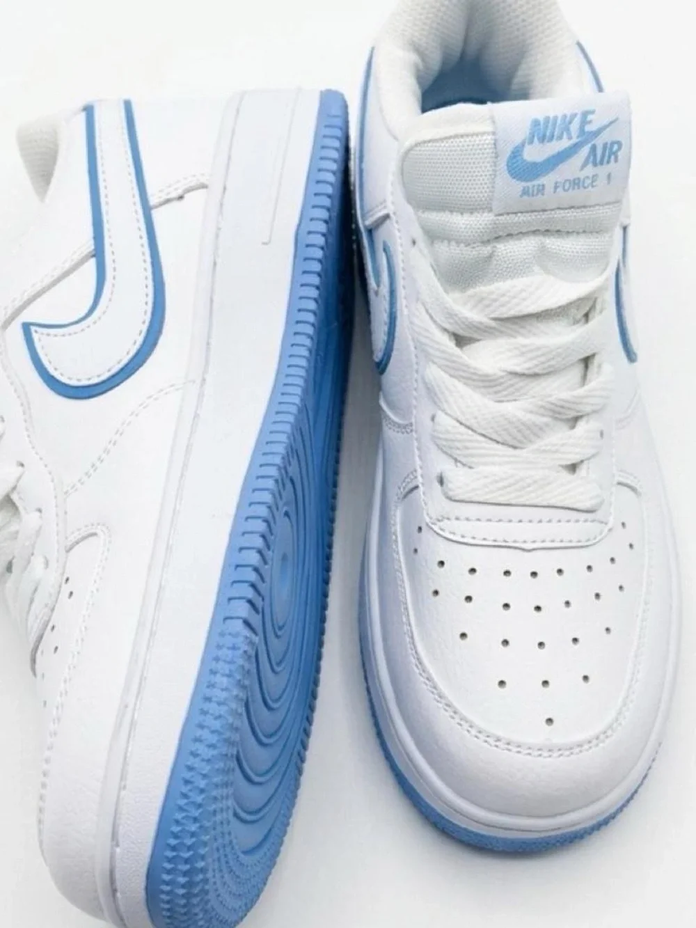 Nike Kids White Sneakers with Light Blue Accents